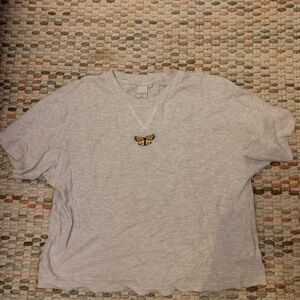 Ghanda Oversized Waffle Knit Tee with embroidered butterfly